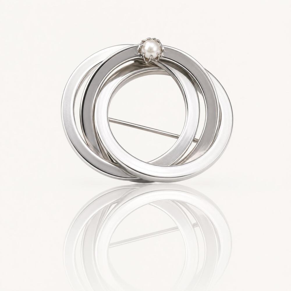 Vintage Silver Tone Triple Interlocking Circle Brooch with Faux Pearl Accent
